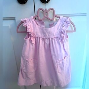 Baby Gap girls pink corduroy sleeveless dress. Ruffle detail on shoulders.